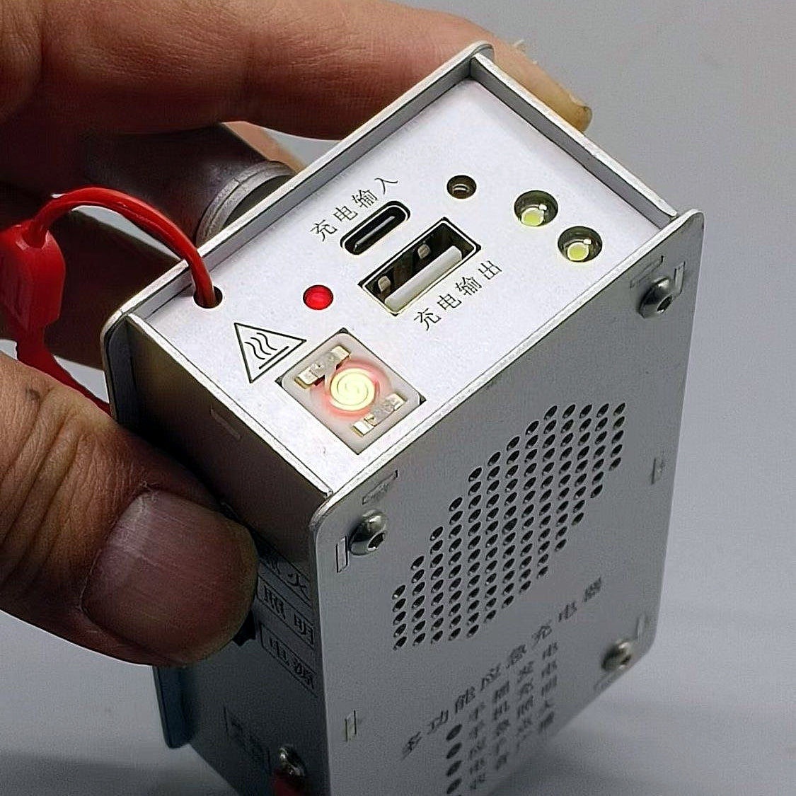 Estación de energía de emergencia con manivela: linterna, encendedor y banco de energía (1000 mAh)-ES
