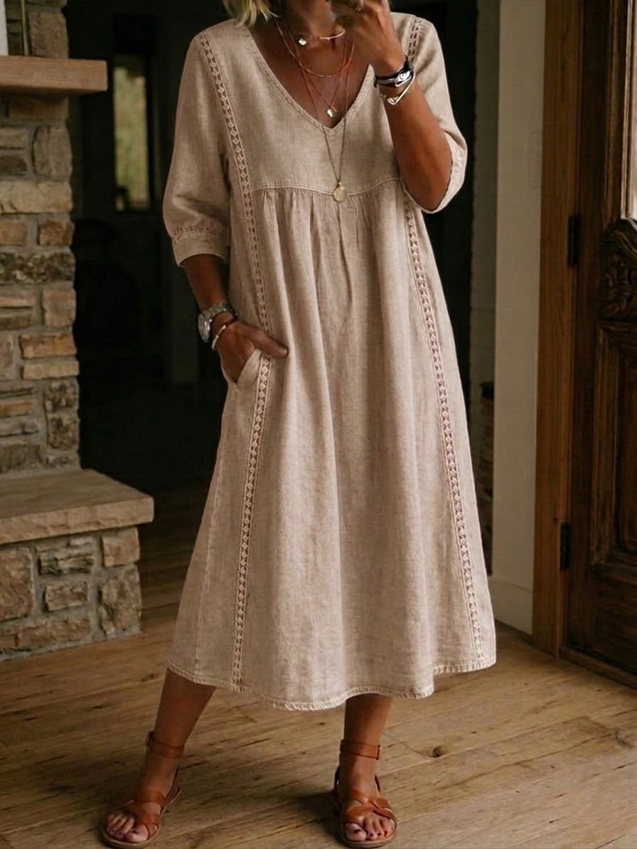 Un vestido holgado e informal confeccionado en lino y algodón con ribete de encaje.-ES