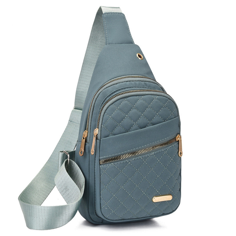 đ„Bolso de pecho con cremallera y mĂșltiples bolsillos-ES