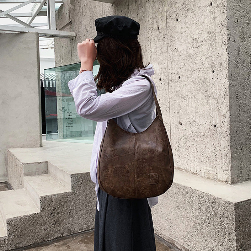 【🎊2025】Uued tooted】👜Naiste vanaaegsed pehmest nahast suure mahuga õlakotid-EE