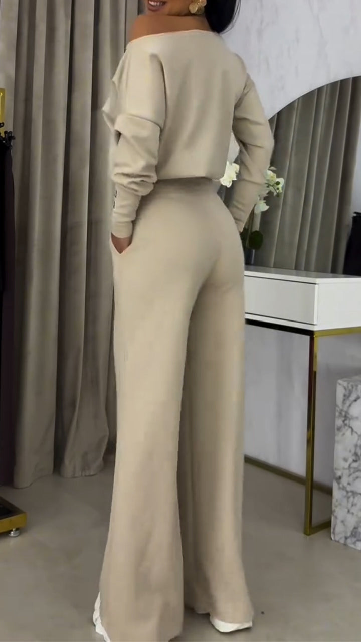 Γυναικείο κοστούμι με φαρδιά μπλούζα με έξω τους ώμους και casual παντελόνι-GR