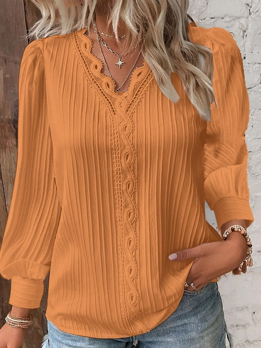 Elegante y moderna camisa de encaje para mujer en un color liso-ES