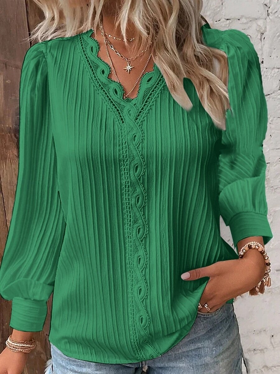 Elegante y moderna camisa de encaje para mujer en un color liso-ES