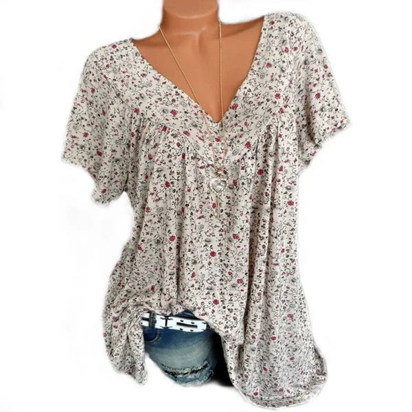 Blusa de moda primaveral con mangas cortas y estampado.-ES