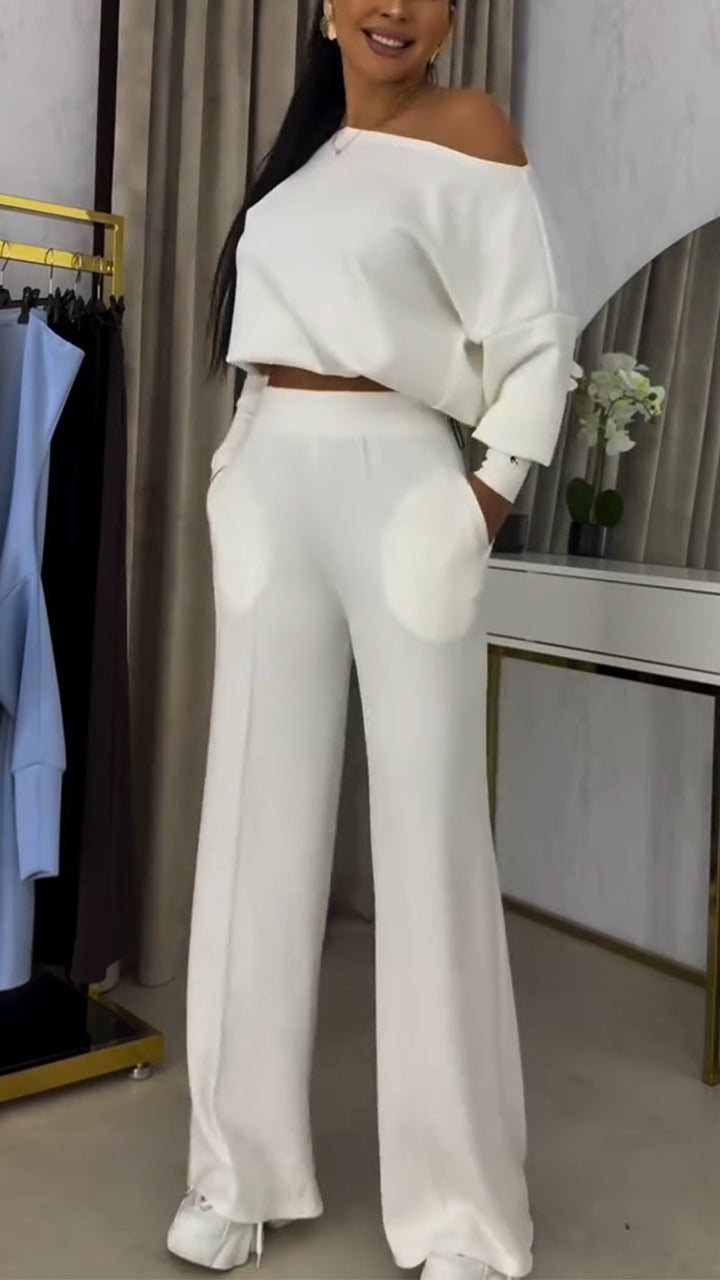 Γυναικείο κοστούμι με φαρδιά μπλούζα με έξω τους ώμους και casual παντελόνι-GR