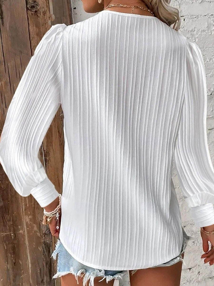 Elegante y moderna camisa de encaje para mujer en un color liso-ES