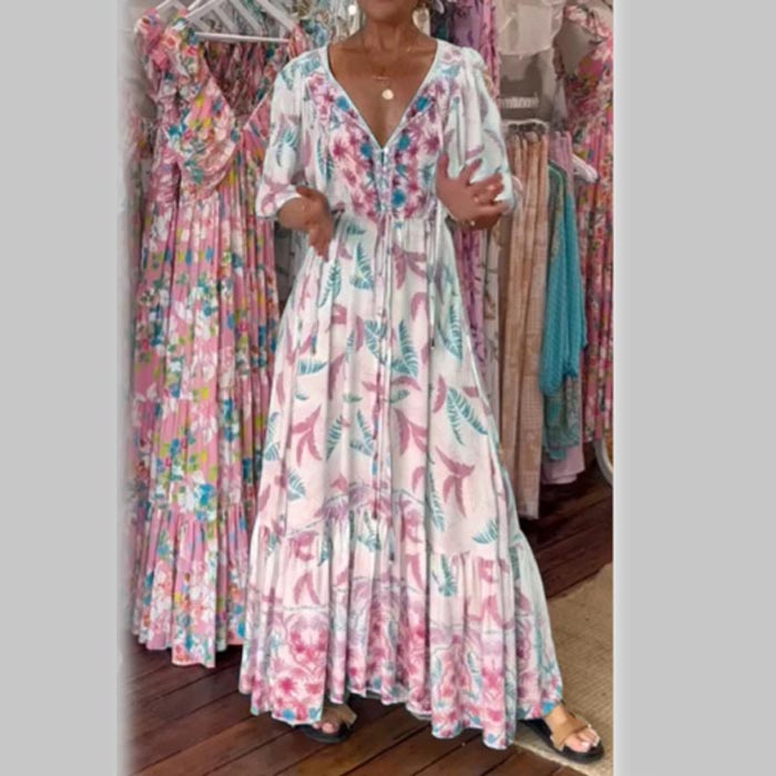 Vestido largo moderno de mujer con cinturón y escote.-ES